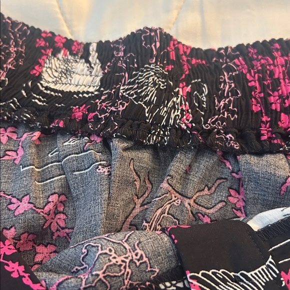 Collectif Black Skirt with Pink Floral and Swan Design - Picture 4 of 4